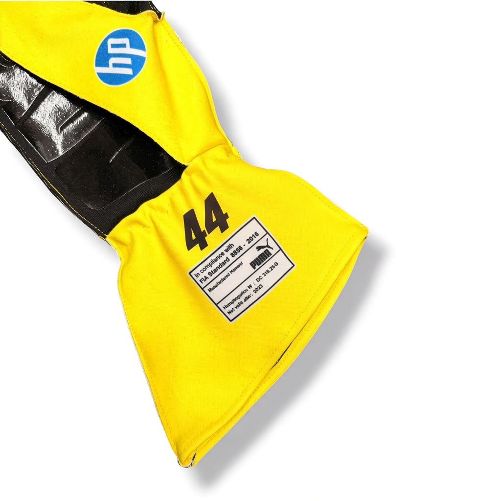 A close-up of a bright yellow protective gear sleeve or cover with black trim, a blue HP logo, the number 44, and a white product label, shown on a white background.