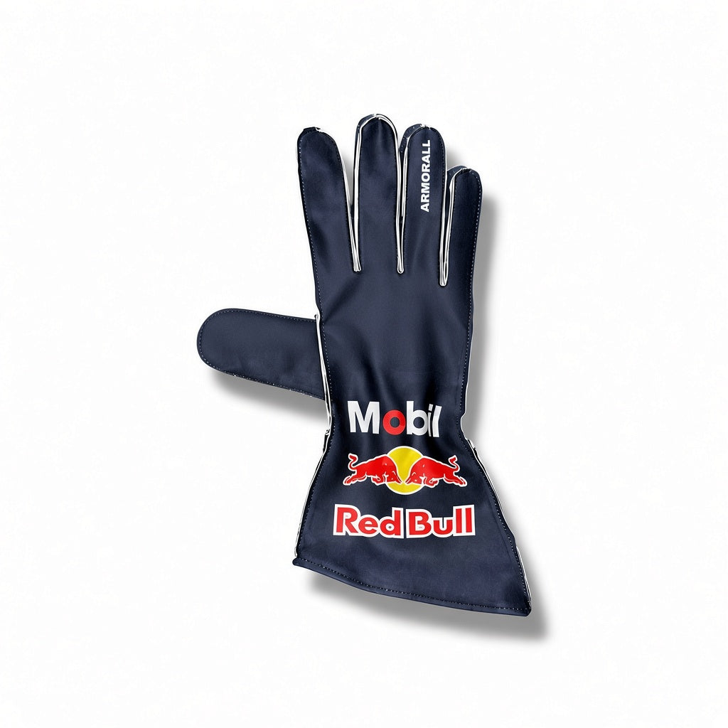 A single dark navy blue racing glove with silver trim and prominent sponsor logos for Mobil and Red Bull on the back, displayed against a clean white background.