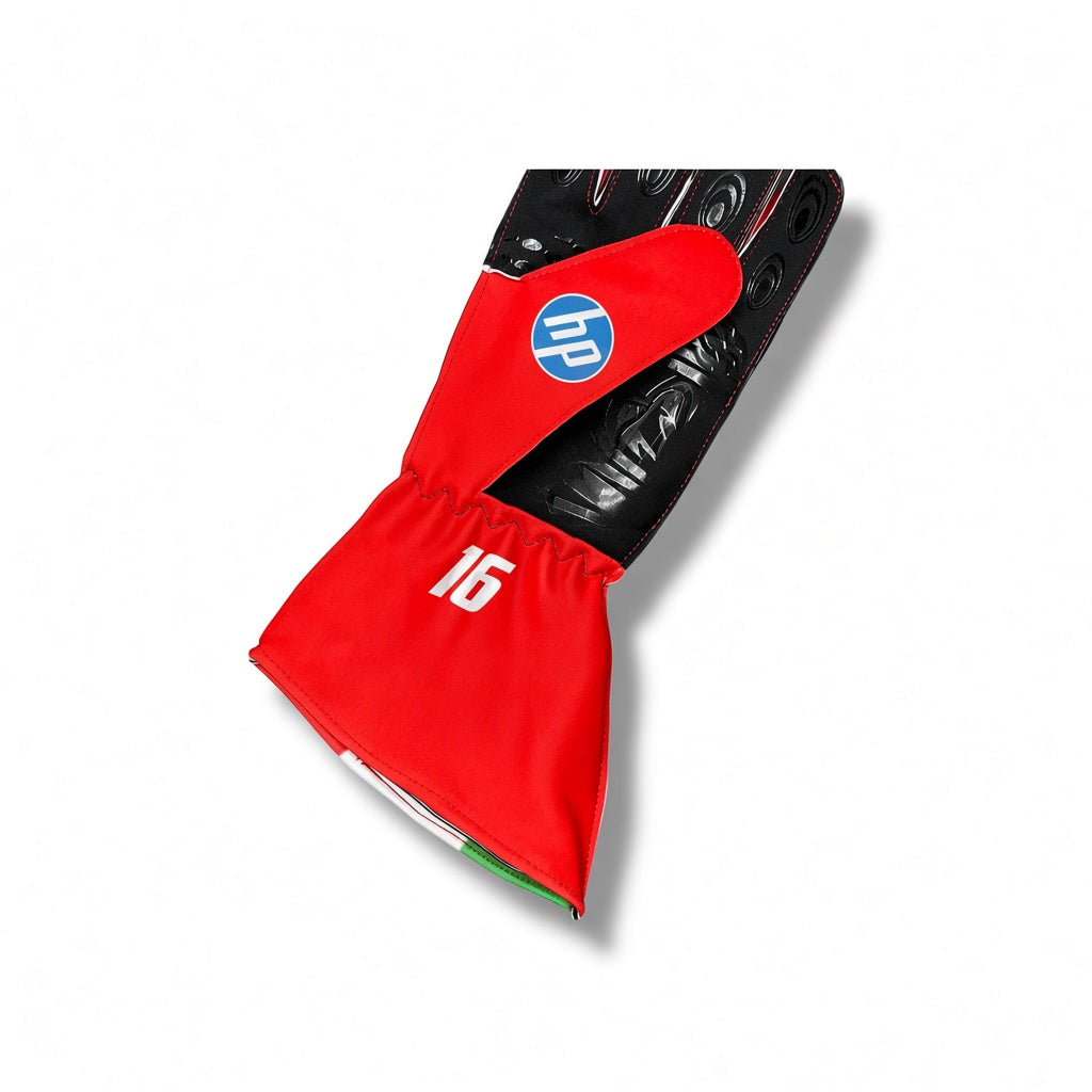 2026 Scuderia Ferrari F1 Gloves shown from the back, featuring a red backhand with a blue circular logo, a black textured palm, and a red wrist cover with the number 16.