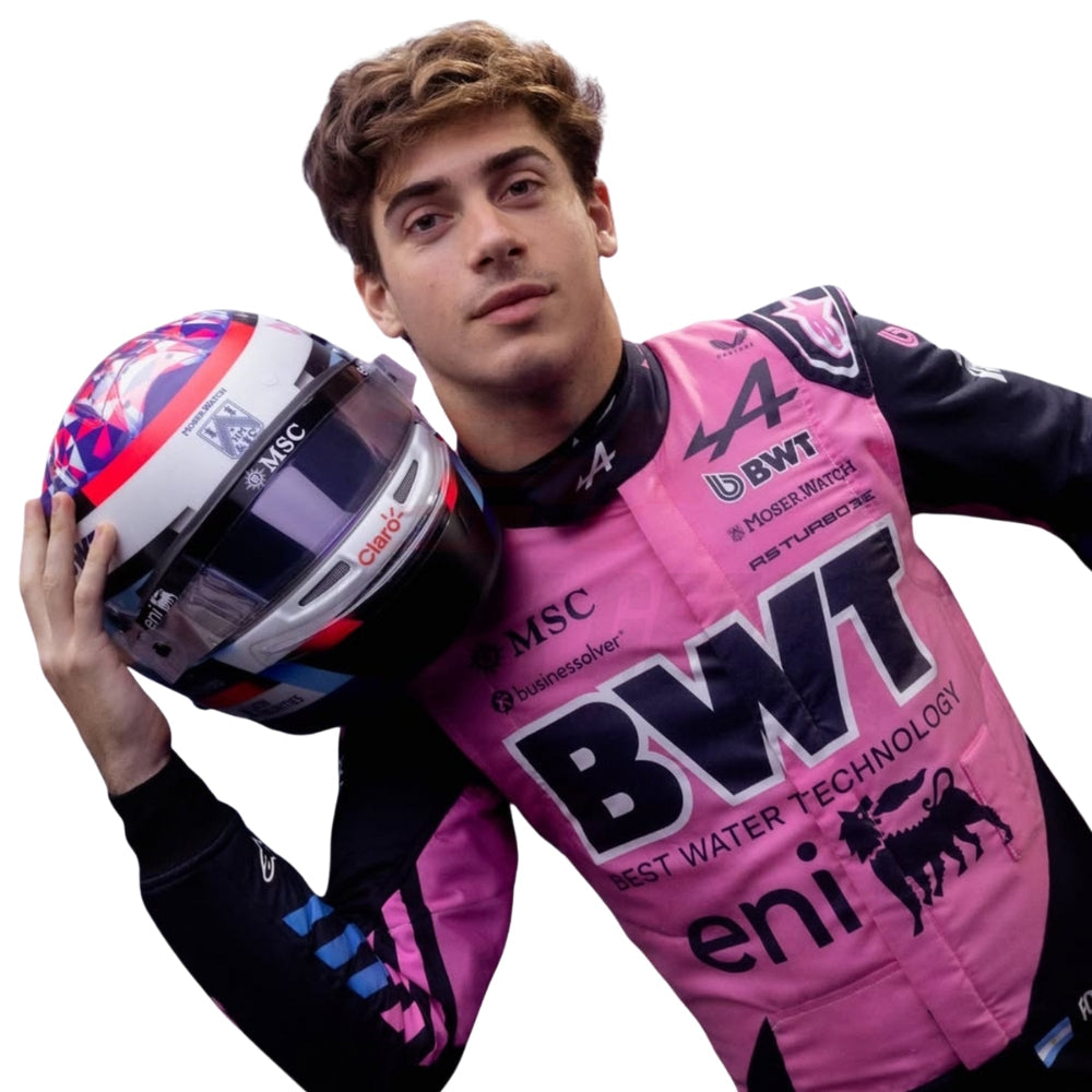 Alpine 2026 F1 Racing Suit Franco Colapinto with various sponsor logos, holding a helmet.