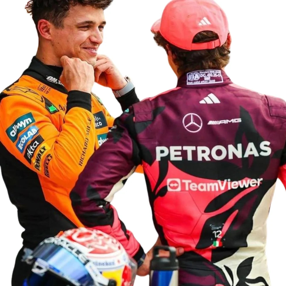 Two Formula 1 drivers in racing suits with visible sponsor logos.