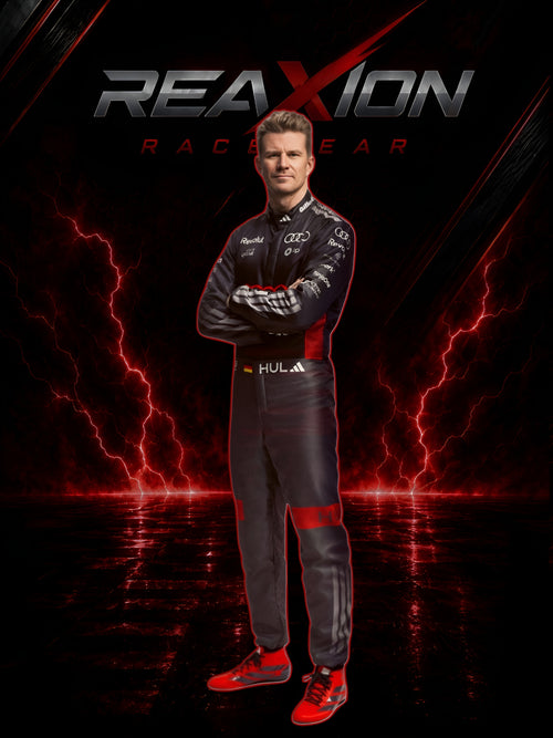 Audi 2026 F1 Racing Suit Nico Hulkenberg with 'REAXION RACGEAR' branding on a dark background with red lightning effects.