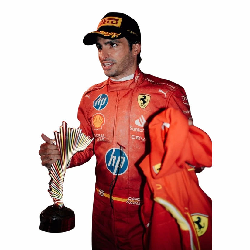 Carlos Sainz in Ferrari 2024 Las Vegas GP F1 Racing Suit holding a trophy on a white background