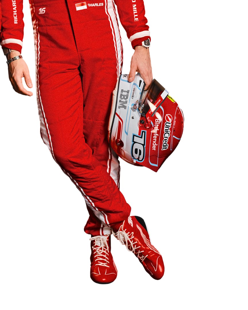 Charles Leclerc 2026 Ferrari F1 racing suit trousers and racing shoes detail view with helmet