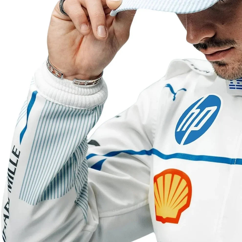 Charles Leclerc Wearing a Ferrari 2025 Monaco GP F1 Racing Suit with logos, including a shell logo and other brand markings.