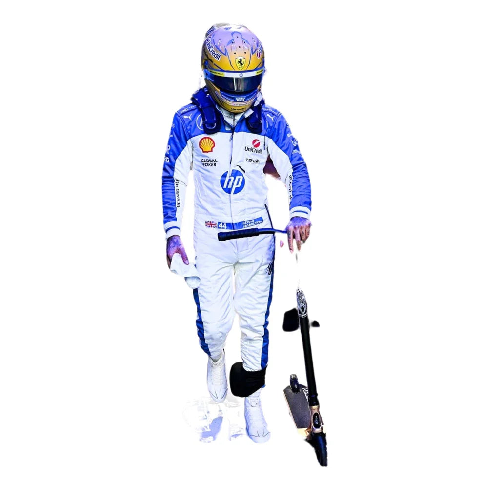 Lewis Hamilton in a Ferrari racing suit with helmet and gloves, holding a racing car on a white background