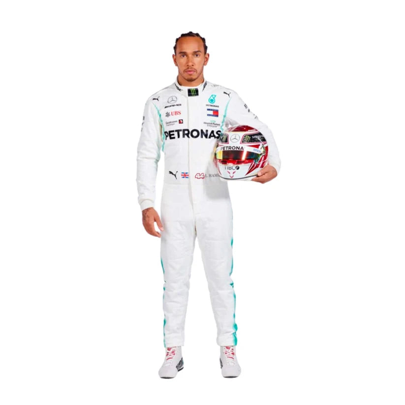 Lewis Hamilton in Mercedes 2019 F1 Racing Suit with Petronas branding, holding a helmet.