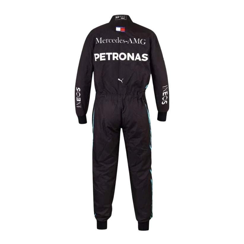 A black Mercedes-AMG Petronas racing suit shown from the back, featuring white sponsor logos and branding, on a solid white background.