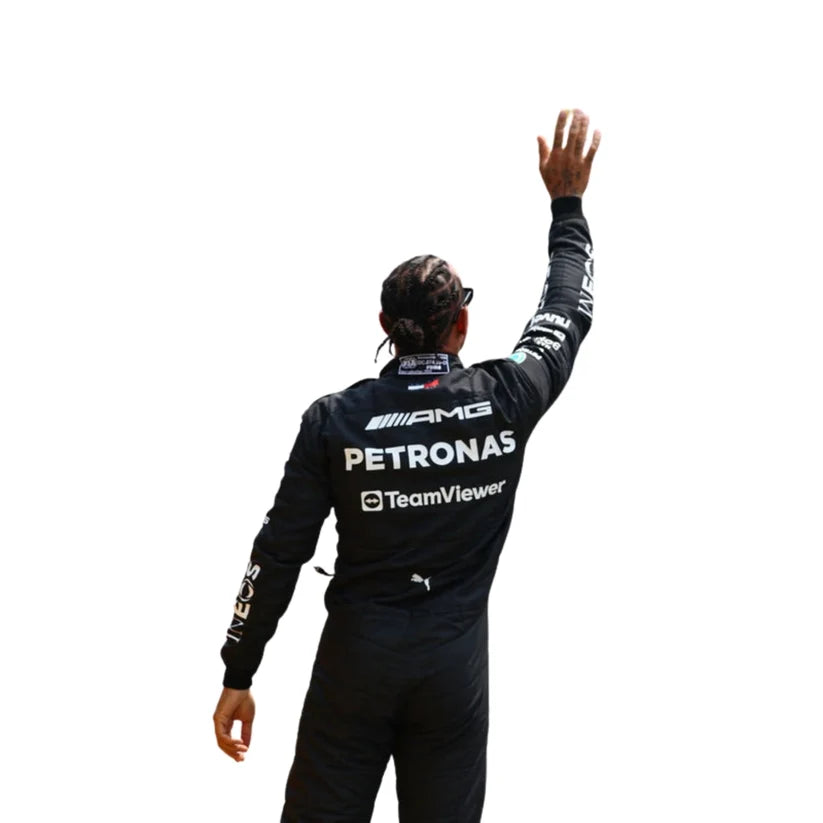 Lewis Hamilton in Mercedes 2023 F1 Racing Suit with visible branding on a white background