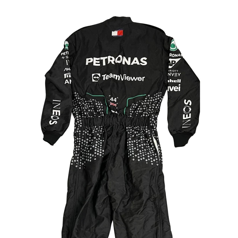 Black racing suit with various sponsor logos on a white background