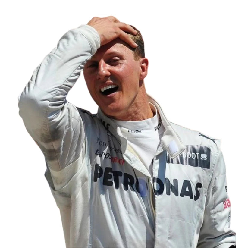 Michael Schumacher in Mercedes 2012 F1 Racing Suit with 'Petronas' branding on a white background