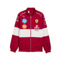 Official PUMA 2025 F1 Vintage Racing Team Jacket with various logos on a white background