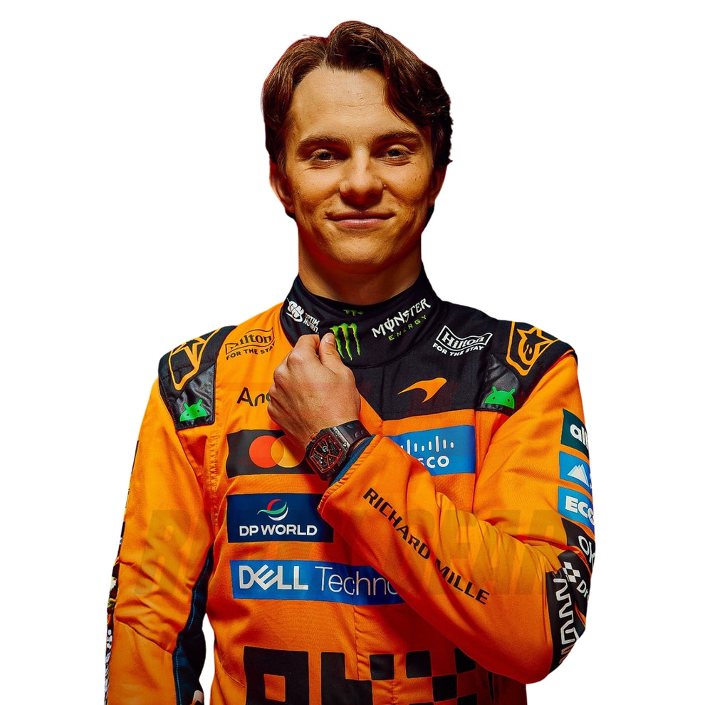 Oscar Piastri 2026 McLaren F1 racing suit close-up portrait showing sponsor patches