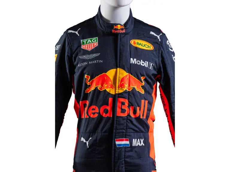 Red Bull racing suit on a mannequin with various sponsor logos.