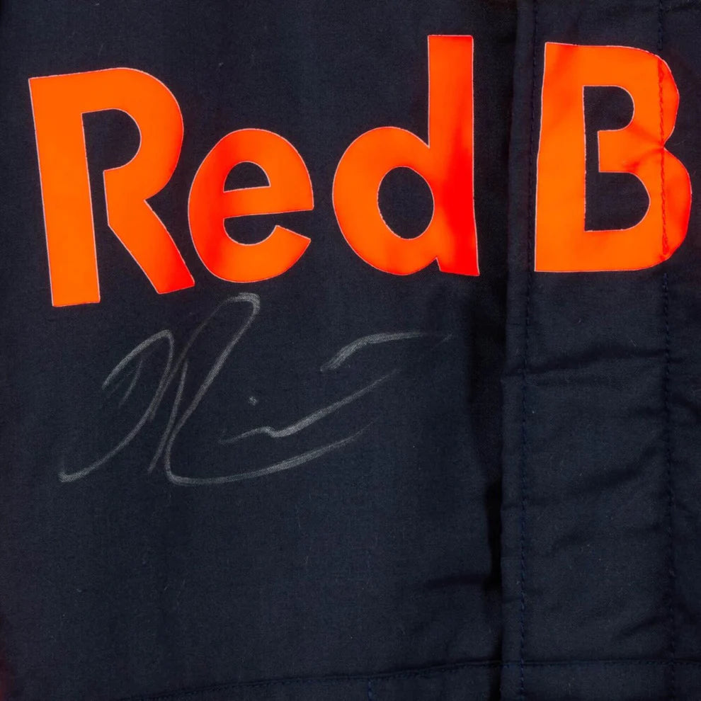 F1 Racing Suit with orange 'Red Bull' logo and signature