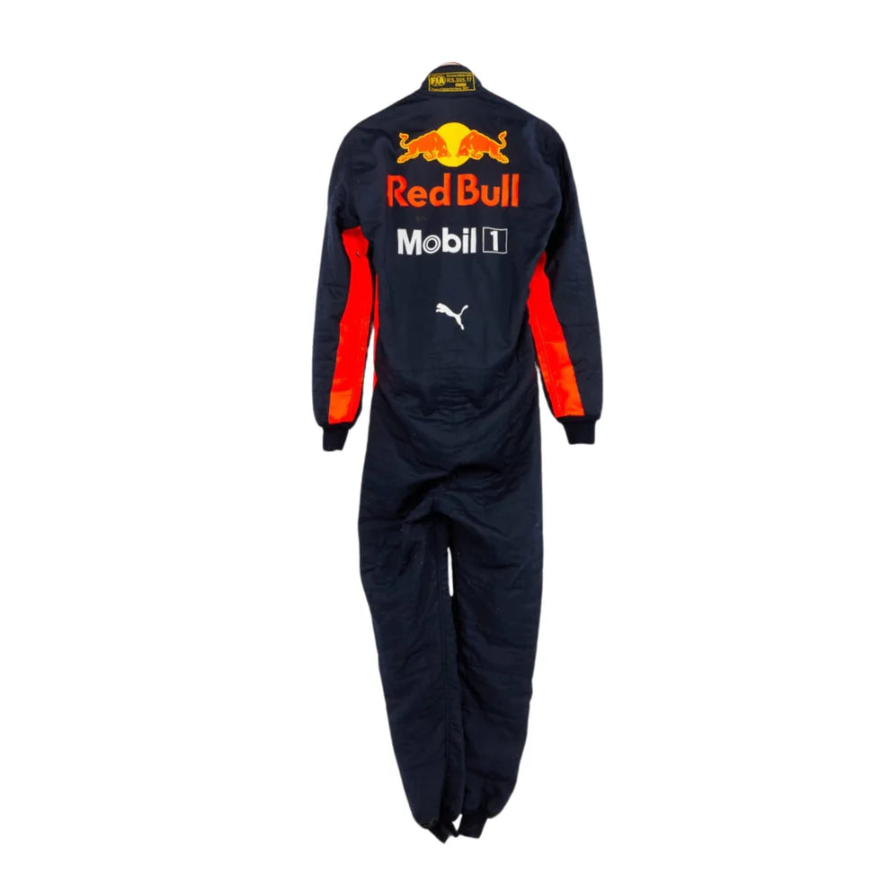 Navy jumpsuit with Red Bull and Mobil branding on a white background