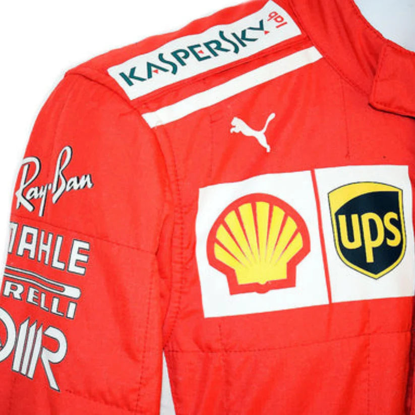 Red racing suit with various brand logos on a white background