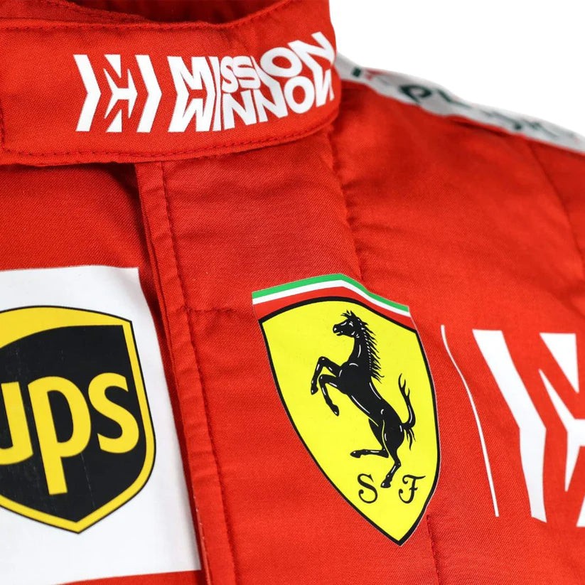 Close-up of a red racing suit with various logos including 'Mission Winnow', 'UPS', and Ferrari.