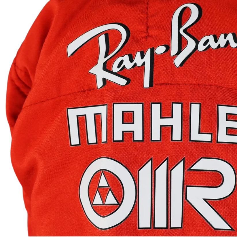 Close-up of a red garment featuring large white and black Ray-Ban and Mahle branding printed across the front.