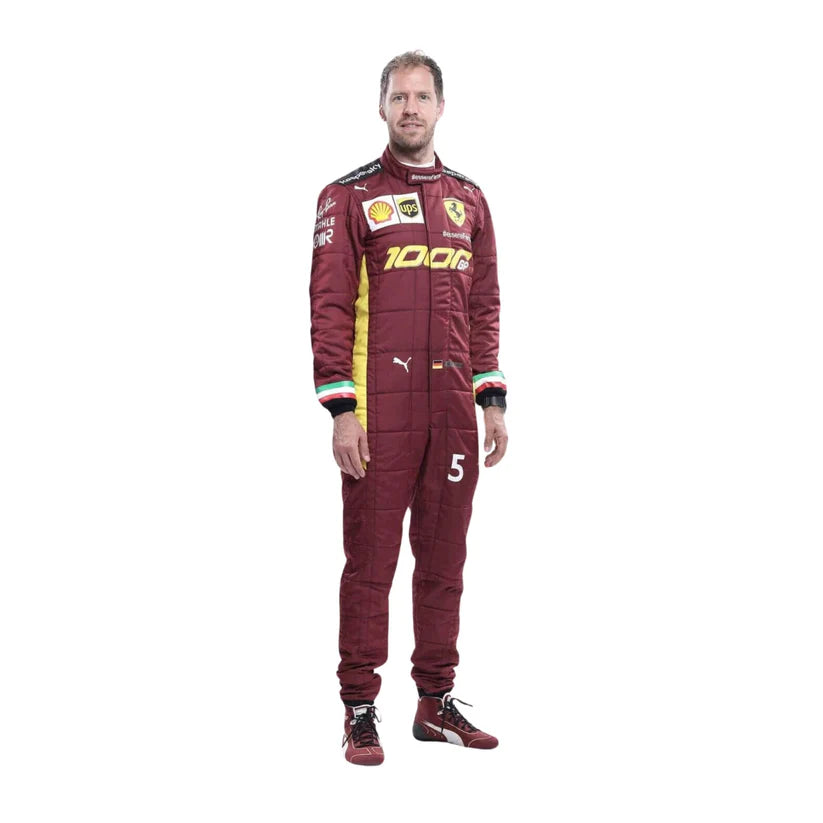 Sebastian Vettel in Ferrari 2020 1000 GP F1 Racing Suit with various sponsor logos, including Puma, Shell, and Castor, standing against a plain white background.
