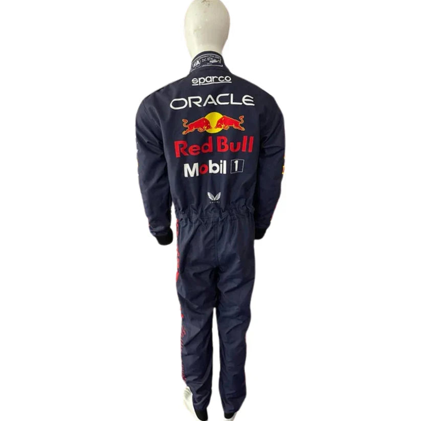 Navy blue racing suit with Red Bull and Mobil logos on a white background