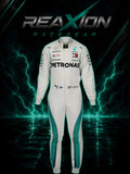 Valtteri Bottas Mercedes 2018 F1 Racing Suit with teal side stripes and multiple sponsor logos, centered against a dark background with teal lightning effects and the REAXION RACEGEAR branding.
