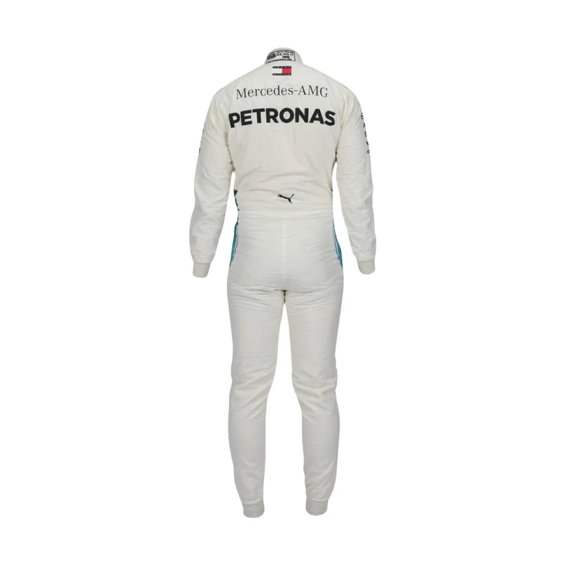 White Mercedes-AMC Petronas racing suit shown from the back, featuring black text logos and a small Puma logo, displayed on a mannequin against a plain white background.