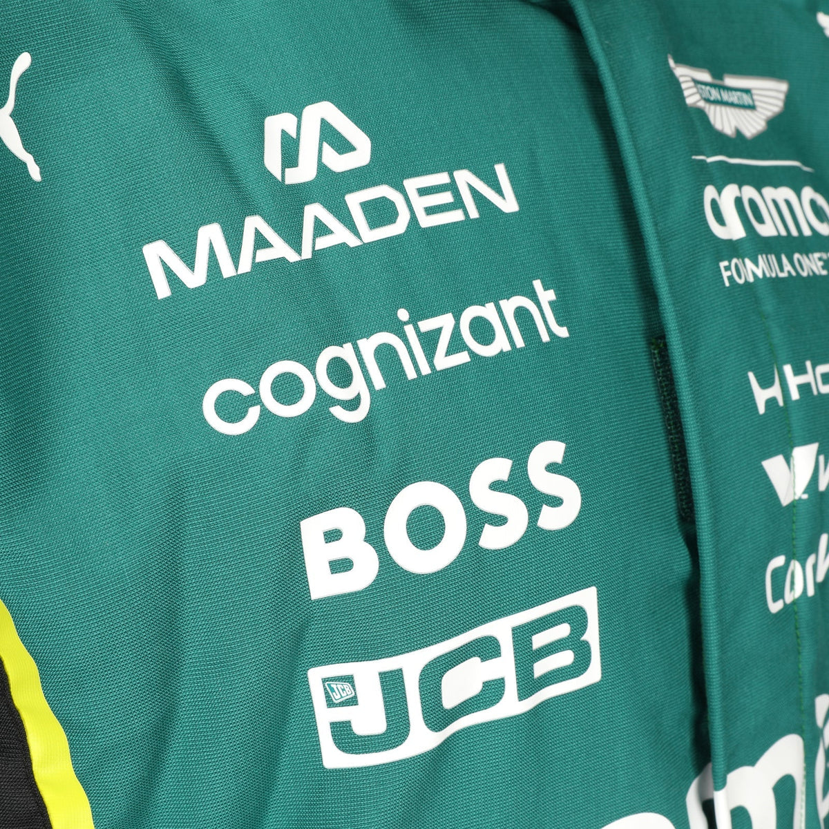 Maaden, Cognizant and BOSS chest logos on Fernando Alonso’s 2026 F1 race suit – Reaxion Racegear.