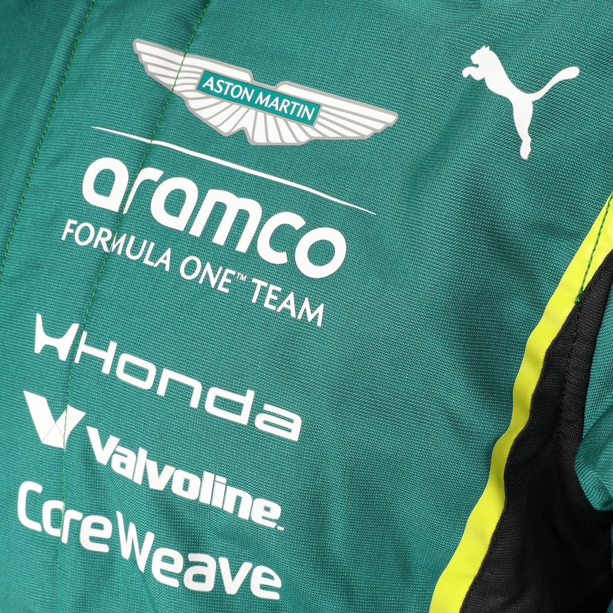 Aston Martin, Aramco and Honda chest logos on the green 2026 F1 race suit – Reaxion Racegear.