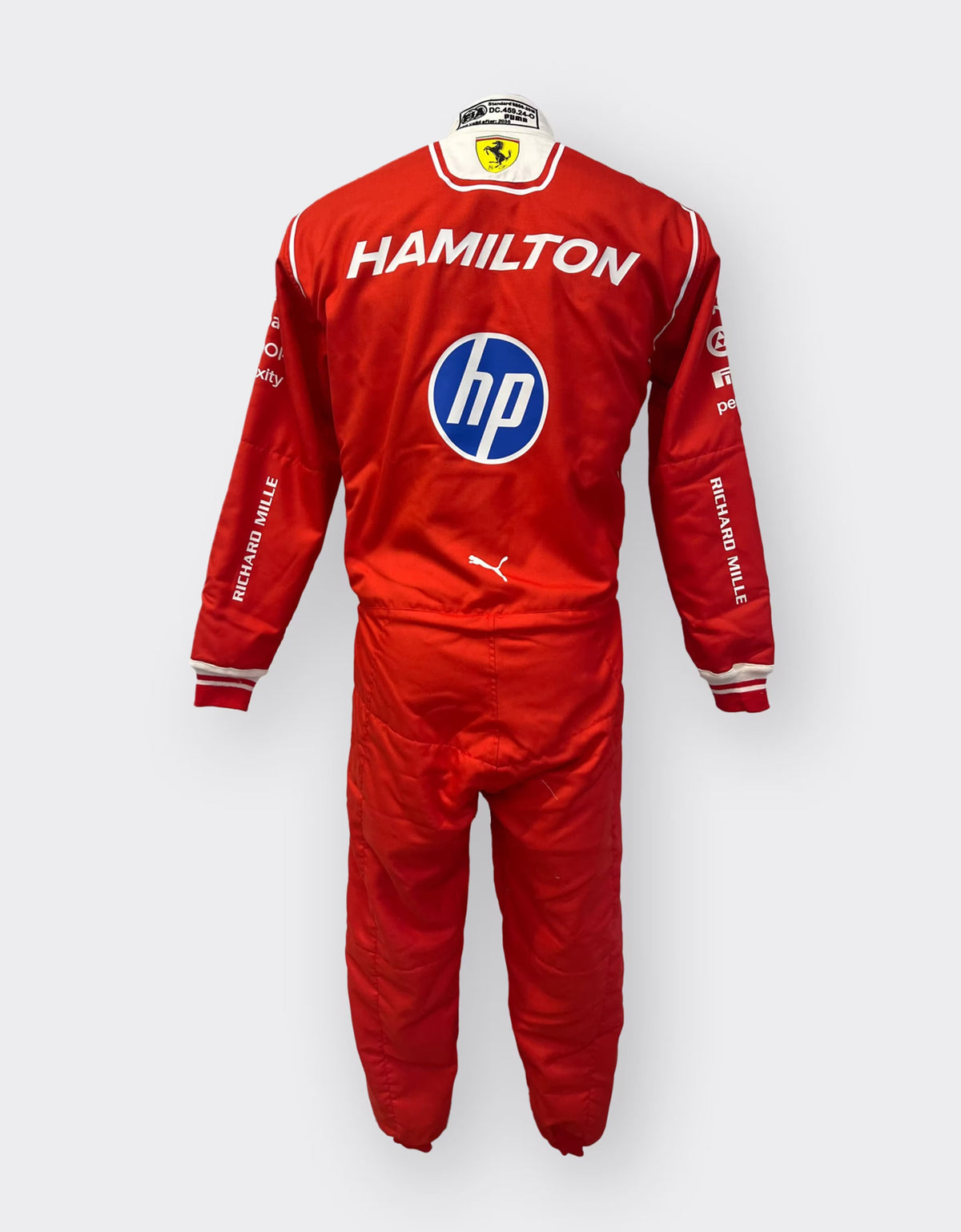 Front of Lewis Hamilton’s 2026 Ferrari HP replica F1 race suit with number 44 – Reaxion Racegear.